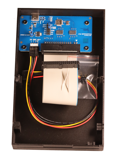 Greaseweazle v4.1 mounted in 3.5" drive enclosure